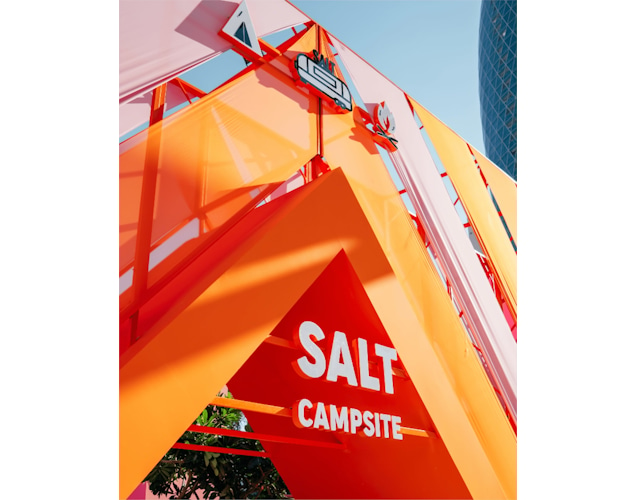 Studio Königshausen's design for SALT CAMP in Dubai redefines camping for foodies, blending the charm of the great outdoors with a touch of glamour. We've created two dining areas, one for SALT and one for Sugar, offering savory meals and sumptuous desserts. The space is filled with interactive features, including a camping store, campfire confession table, and a stargazing area, all reflecting the brand's personality. Königshausen: your partner in design, concept development, and scenography.